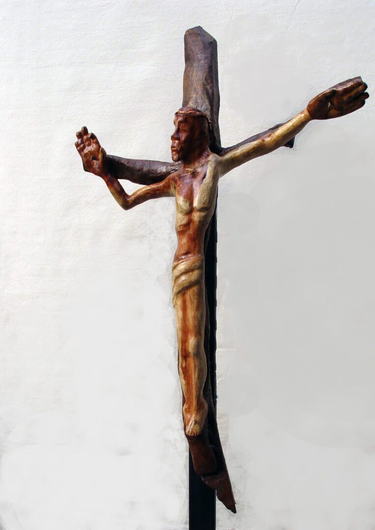 A wooden crucifix with jesus on it