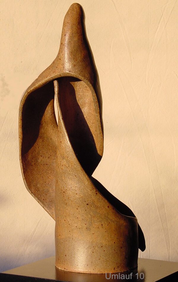 A sculpture of a person 's foot is shown.
