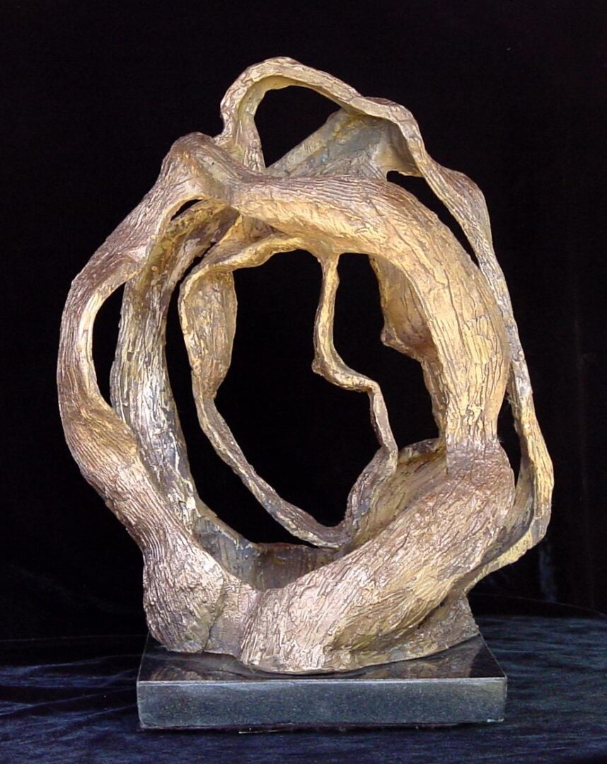 A bronze sculpture of a spiral showcased in a Fine Art Gallery